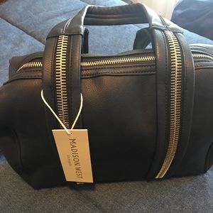 Navy purse by Madison West, new never used